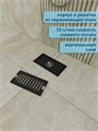 Трап для душа с сухим затвором вертикальный выпуск Watersense Eva 10х20 c решеткой черный W00430